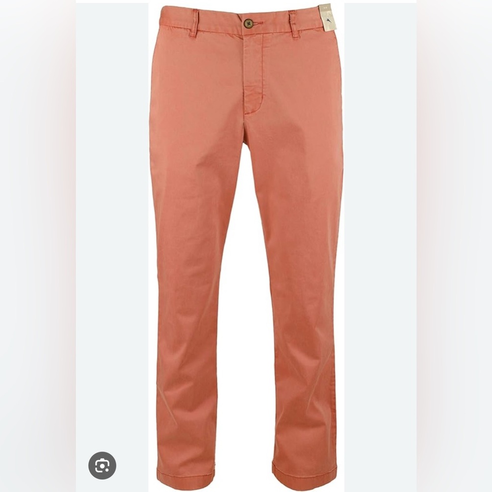 TOMMY BAHAMA flat front chinos in light tangerine color. Size 36x30.